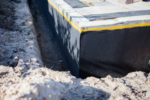Professional Waterproofing technician working in Kunkle, OH